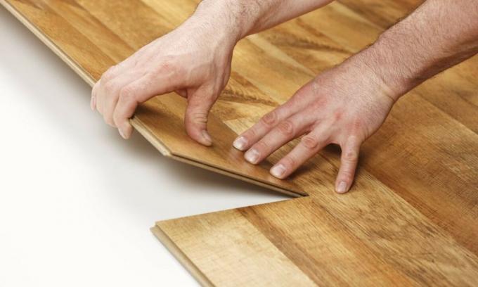 Meletakkan laminate flooring dengan tangan Anda sendiri. Petunjuk langkah demi langkah.