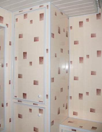 Penerapan panel PVC untuk dinding kelongsong dan lemari di dapur
