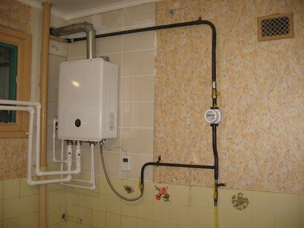 Cara menyembunyikan pemanas air gas di dapur: Instruksi video DIY, harga, foto